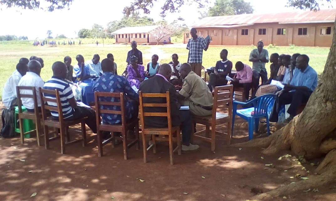 Community Dialogue Under the Tree